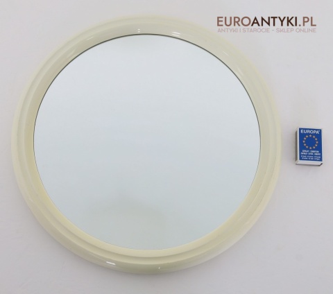 kremowe okrągłe lustro ścienne