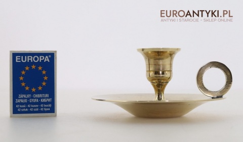 stary świecznik z odlewu mosiężnego