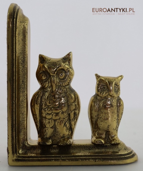 symbol mądrości sowy na podpórkach