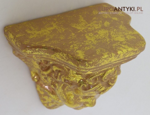 Antyczne wsporniki ścienne retro – złocone dekoracje vintage z motywami roślinnymi