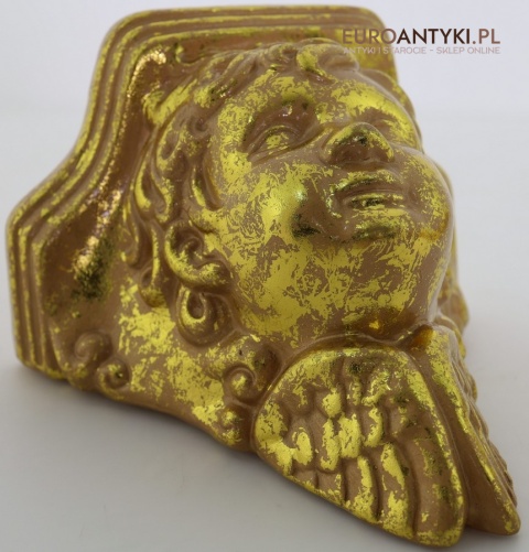 Antyczne wsporniki ścienne retro – złocone dekoracje vintage z motywami roślinnymi