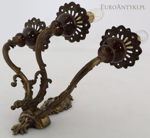 duży kinkiet neobarokowy o szerokości 32 cm