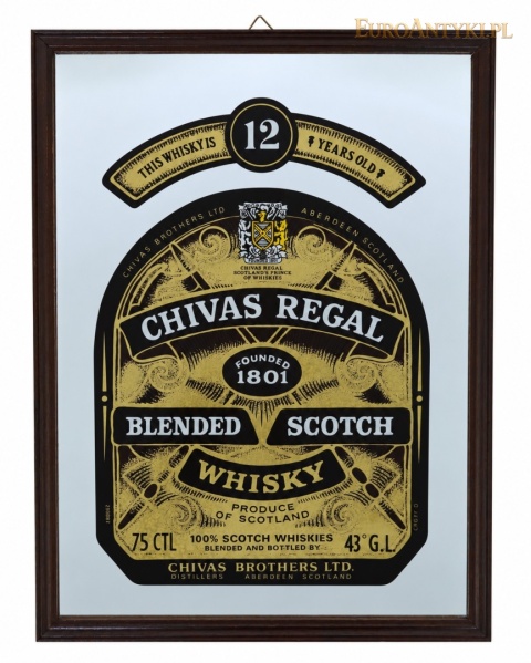 lustrzany szyld Chivas Regal z czarno-złotą grafiką w ciemnej drewnianej ramce