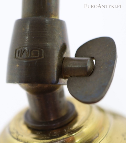 oznaczenie OMI na mechanizmie regulacyjnym lampy