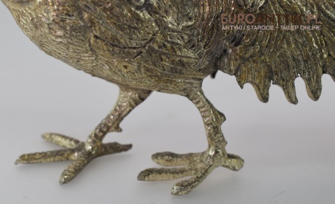 Dekoracyjny srebrny bażant w kolorze starego srebra.