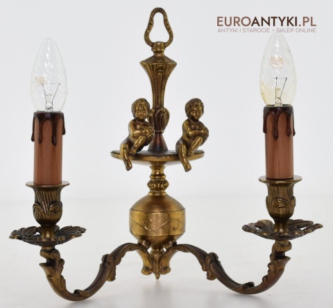 kinkiet z cherubinami