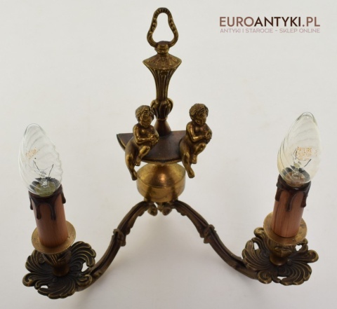 Zabytkowy kinkiet z cherubinkami lampka ścienna muzealna retro oświetlenie