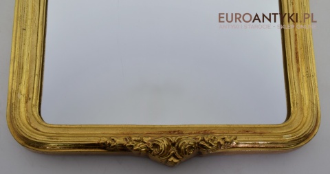 Pałacowe lustro w złotej ramie. Sklep ze starociami.