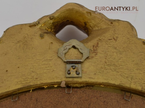 Pałacowe lustro w złotej ramie. Sklep ze starociami.