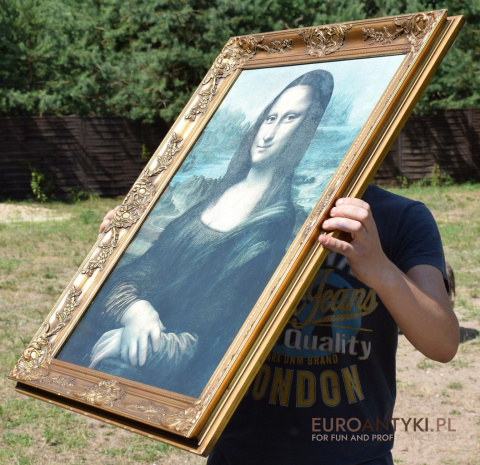 Mona Lisa stary obraz w złotych drewnianych ramach.