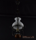 rustykalna lampa widząca w góralskim stylu